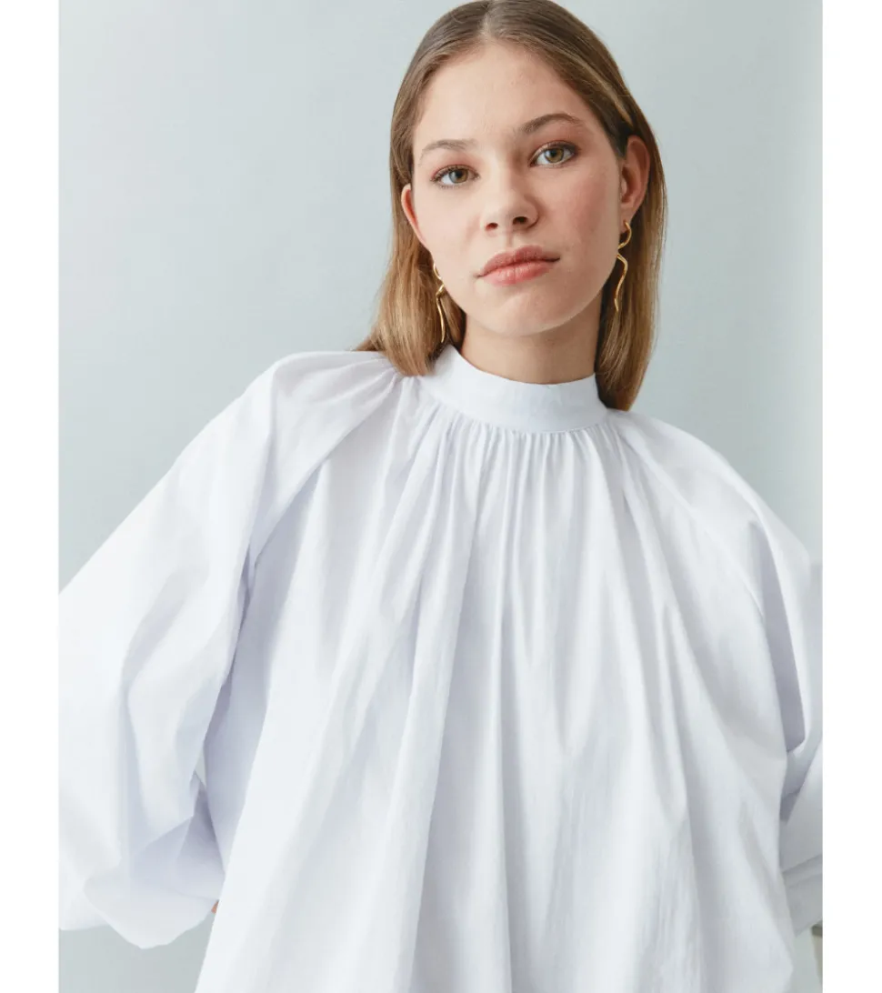 BLUSA ABULLONADA