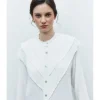 BLUSA BOTONES CON VOLANTES