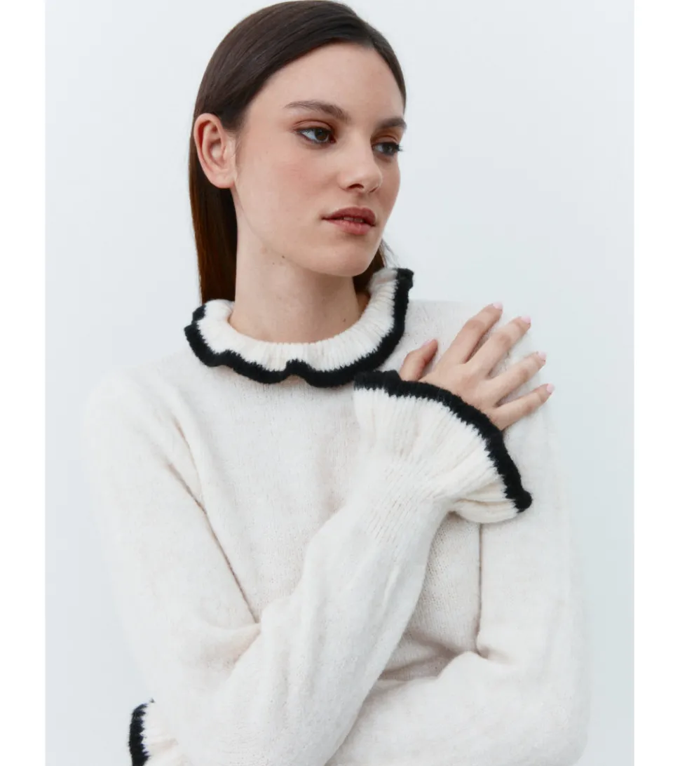 JERSEY CUELLO VOLANTE